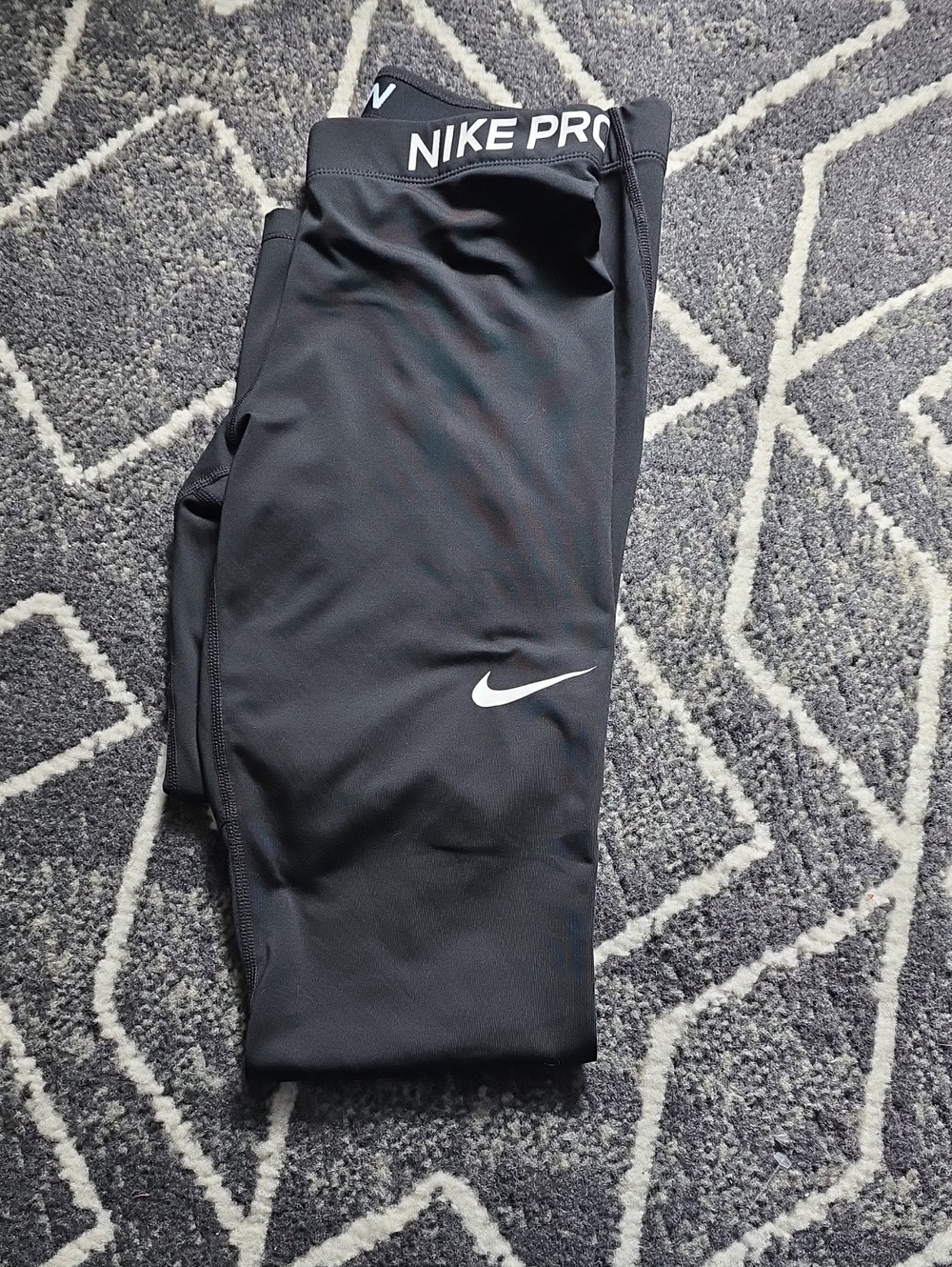 Nike Black Kids Performance Leggings with White Swoosh